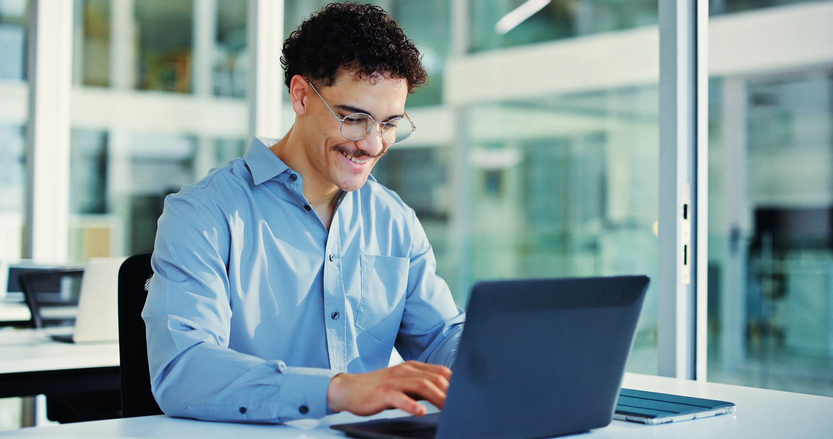 Analyst working at a laptop