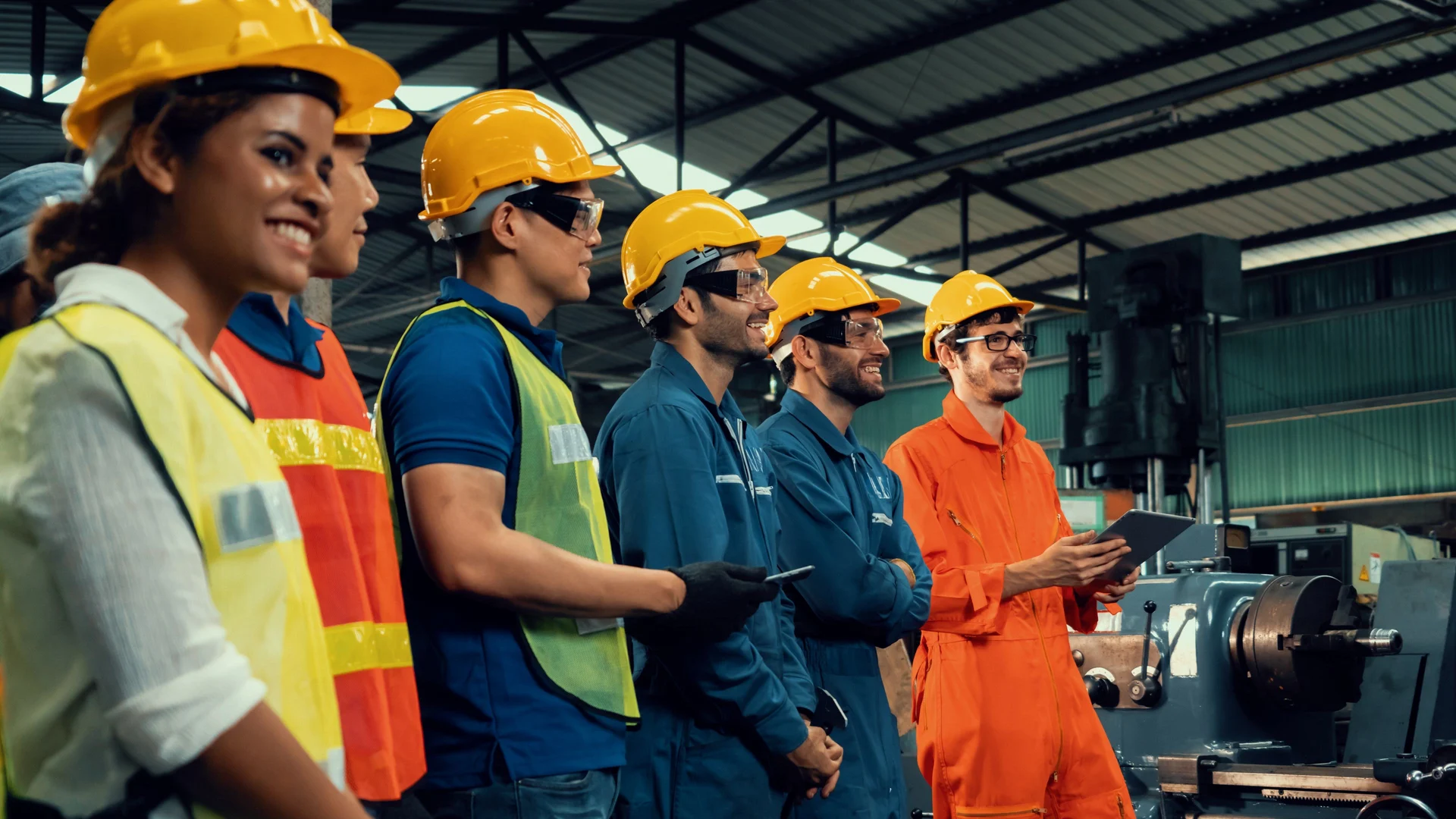 Manufacturing team gathered on the plant floor