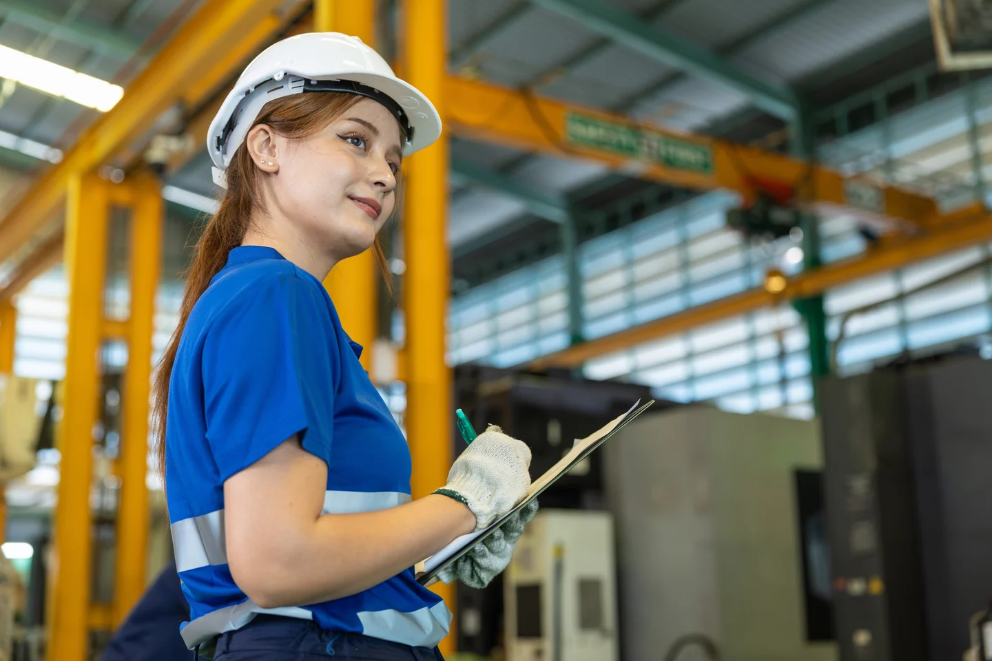 Plant supervisor reviewing capacity plans