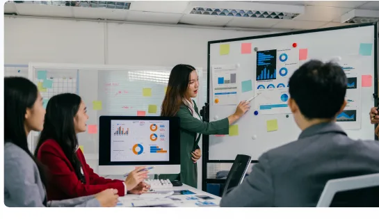 Business team reviewing analytics presentation