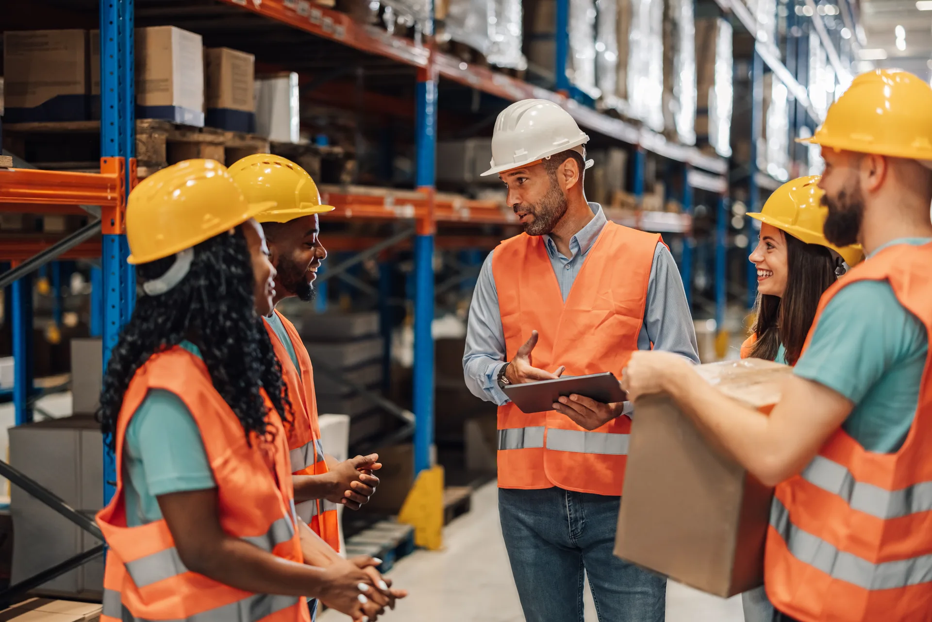 Warehouse operations team discussing daily plans
